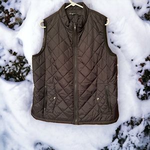 Get ready for fall with black quilted vest